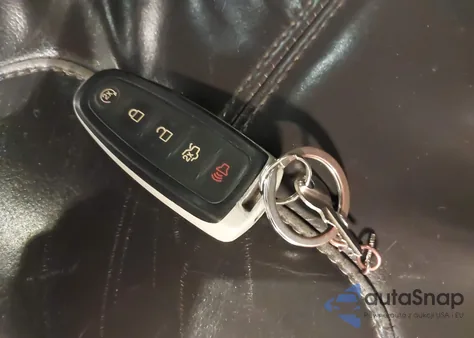 2015 Ford Focus Titanium z USA, uszkodzony, nr VIN 1FADP3J27FL280611